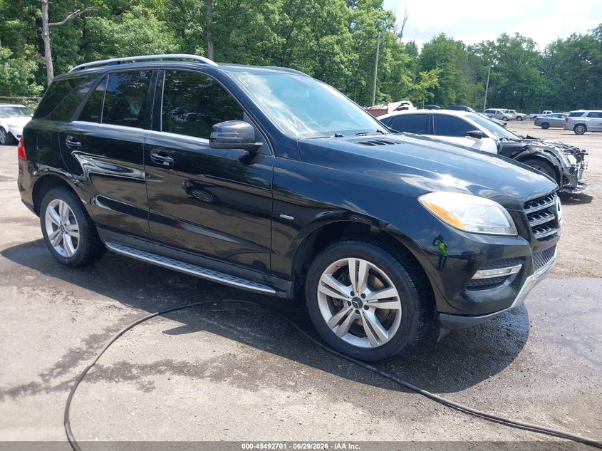 2012 Mercedes-benz M-klasse VIN 4JGDA5HBXCA019327 IAAI salvage auction — SIDE, Salvage Title, sold $3,250 on 2026-07-31 (photo 1)