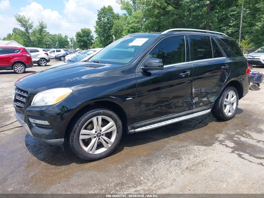 2012 Mercedes-benz M-klasse VIN 4JGDA5HBXCA019327 IAAI salvage auction — SIDE, Salvage Title, sold $3,250 on 2026-07-31 (photo 2)