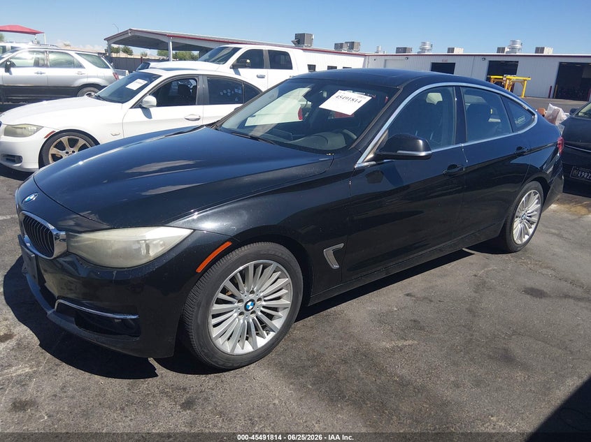 2014 BMW 3er VIN WBA3X5C53ED556863 IAAI salvage auction — NORMAL WEAR, Clear (Virginia), sold $675 on 2026-07-10 (photo 2)