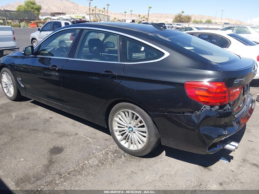 2014 BMW 3er VIN WBA3X5C53ED556863 IAAI salvage auction — NORMAL WEAR, Clear (Virginia), sold $675 on 2026-07-10 (photo 3)