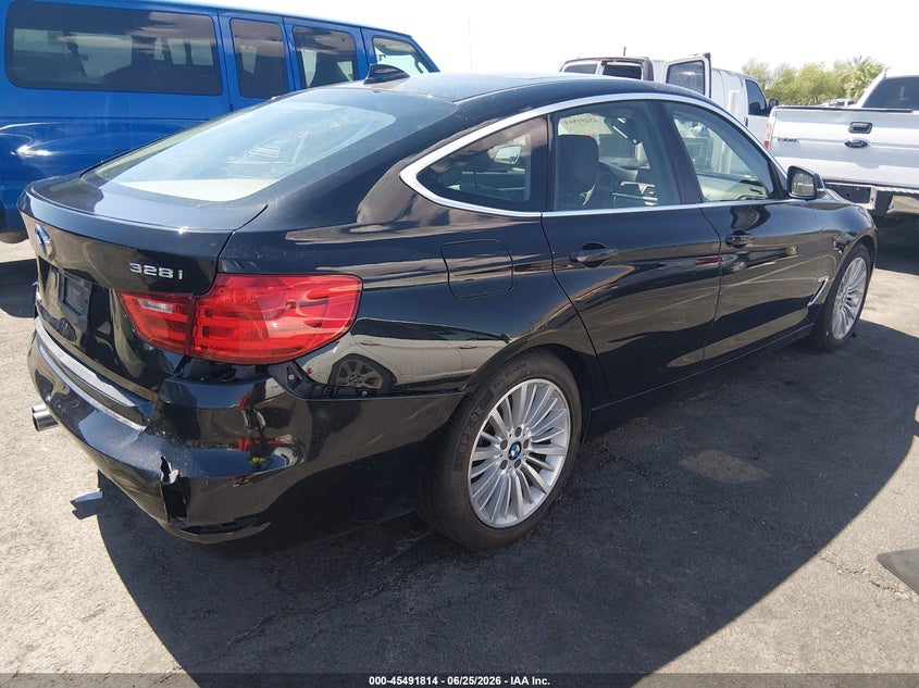 2014 BMW 3er VIN WBA3X5C53ED556863 IAAI salvage auction — NORMAL WEAR, Clear (Virginia), sold $675 on 2026-07-10 (photo 4)
