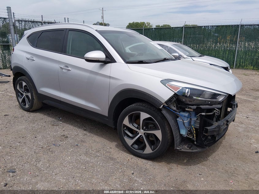 2016 Hyundai Tucson VIN KM8J33A21GU034976 IAAI salvage auction — FRONT & REAR, Salvage (Kansas), sold $2,350 on 2026-07-24 (photo 1)