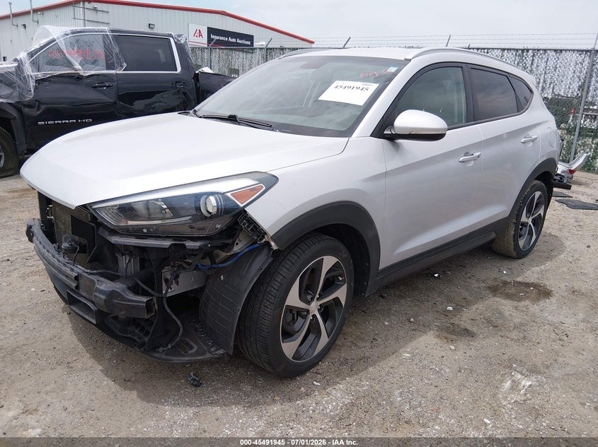 2016 Hyundai Tucson VIN KM8J33A21GU034976 IAAI salvage auction — FRONT & REAR, Salvage (Kansas), sold $2,350 on 2026-07-24 (photo 2)
