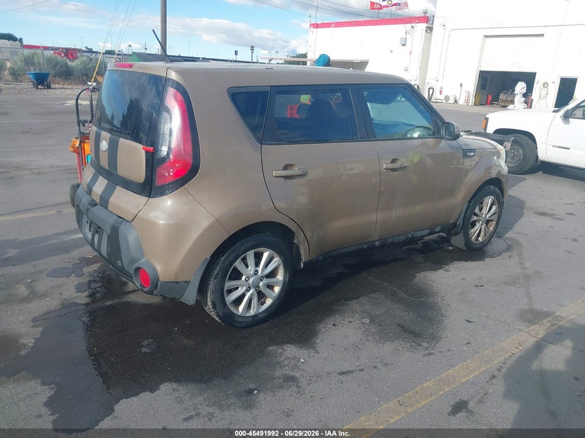 2014 Kia Soul VIN KNDJN2A21E7007779 IAAI salvage auction — NORMAL WEAR, Rebuilt/Restored (Utah), sold $325 on 2026-07-09 (photo 4)