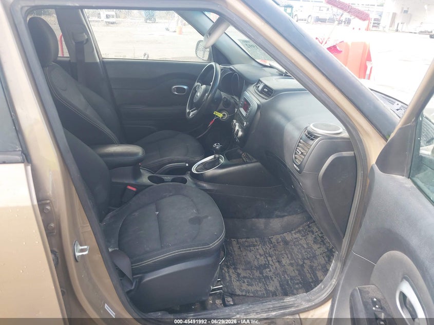 2014 Kia Soul VIN KNDJN2A21E7007779 IAAI salvage auction — NORMAL WEAR, Rebuilt/Restored (Utah), sold $325 on 2026-07-09 (photo 5)
