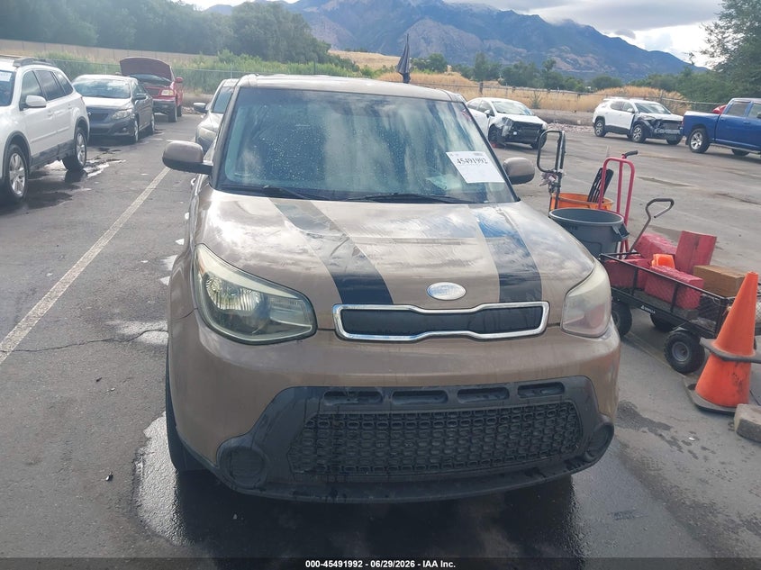 2014 Kia Soul VIN KNDJN2A21E7007779 IAAI salvage auction — NORMAL WEAR, Rebuilt/Restored (Utah), sold $325 on 2026-07-09 (photo 6)