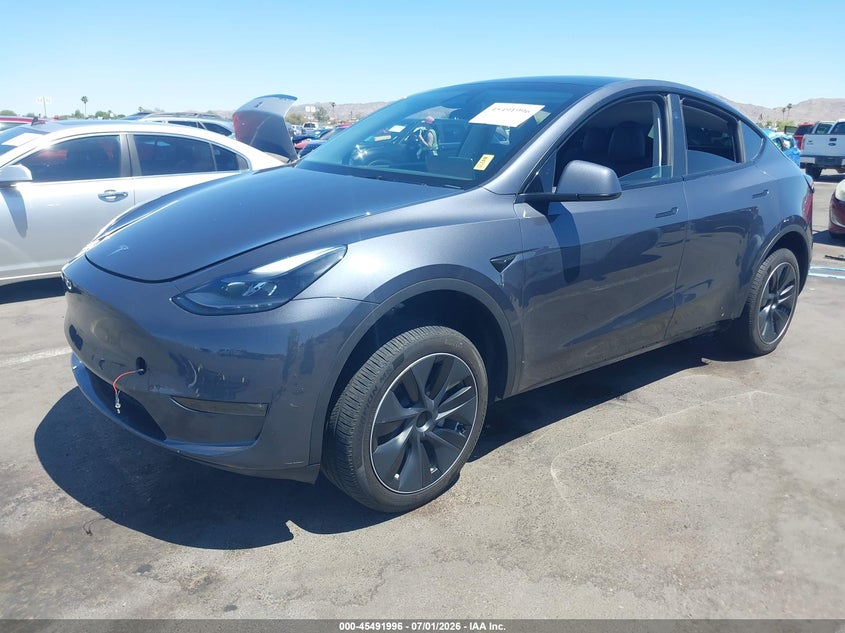 2023 Tesla Model y VIN 7SAYGDEE6PA210950 IAAI salvage auction — RIGHT FRONT, Salvage (Arizona), sold $8,300 on 2026-07-28 (photo 2)