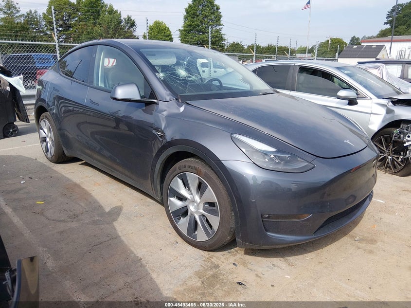 2023 Tesla Model y VIN 7SAYGDEE1PF881154 IAAI salvage auction — STORM DAMAGE, Salvage (Idaho), sold $11,000 on 2026-07-23 (photo 1)