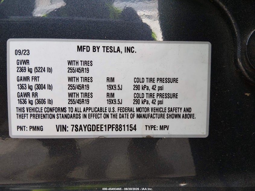 2023 Tesla Model y VIN 7SAYGDEE1PF881154 IAAI salvage auction — STORM DAMAGE, Salvage (Idaho), sold $11,000 on 2026-07-23 (photo 9)