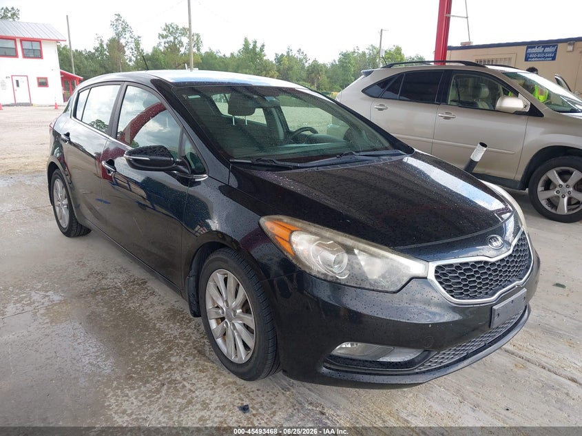 2015 Kia Forte VIN KNAFX5A88F5323261 IAAI salvage auction — NORMAL WEAR, Clear (Florida), sold $1,100 on 2026-07-28 (photo 1)