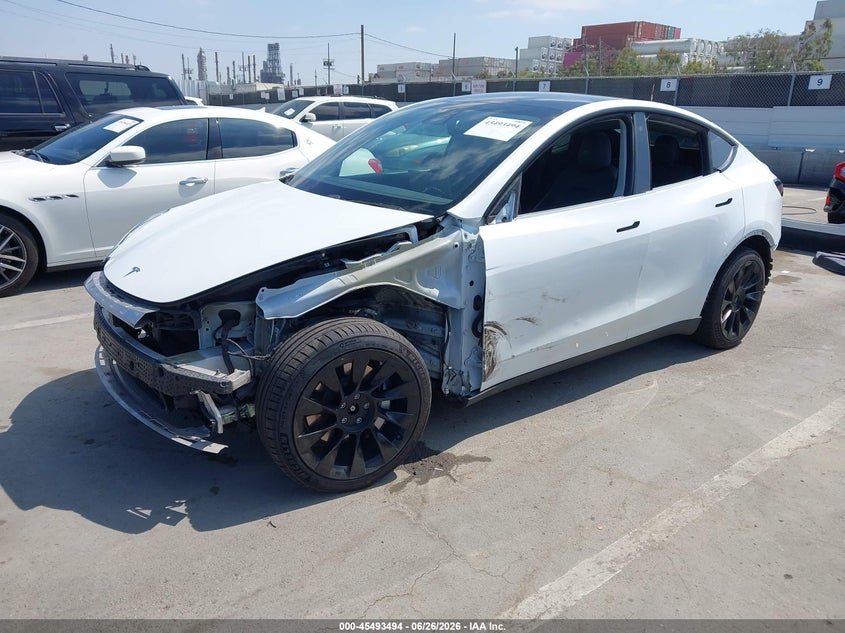 2020 Tesla Model y VIN 5YJYGDEF2LF002373 IAAI salvage auction — ALL OVER, Salvage (California), sold $8,500 on 2026-07-13 (photo 2)