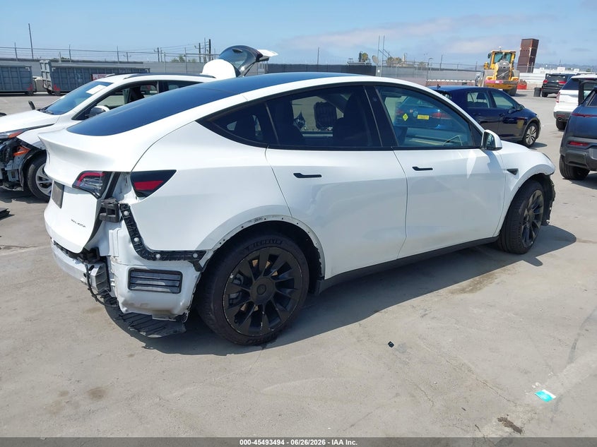 2020 Tesla Model y VIN 5YJYGDEF2LF002373 IAAI salvage auction — ALL OVER, Salvage (California), sold $8,500 on 2026-07-13 (photo 4)