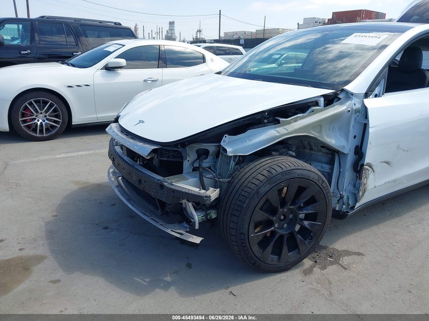 2020 Tesla Model y VIN 5YJYGDEF2LF002373 IAAI salvage auction — ALL OVER, Salvage (California), sold $8,500 on 2026-07-13 (photo 6)