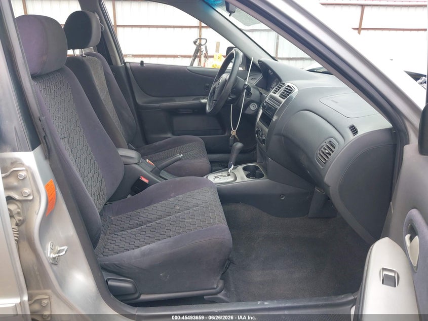 2002 Mazda Protege VIN JM1BJ226320638927 IAAI salvage auction — FRONT & REAR, Bill Of Sale (Washington), sold $300 on 2026-07-14 (photo 5)