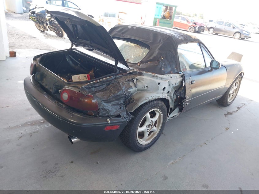 1992 Mazda Mx-5 VIN JM1NA3511N1316854 IAAI salvage auction — NORMAL WEAR, Clear (Florida), sold $225 on 2026-07-22 (photo 4)