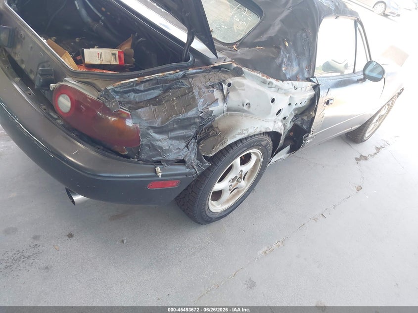 1992 Mazda Mx-5 VIN JM1NA3511N1316854 IAAI salvage auction — NORMAL WEAR, Clear (Florida), sold $225 on 2026-07-22 (photo 6)