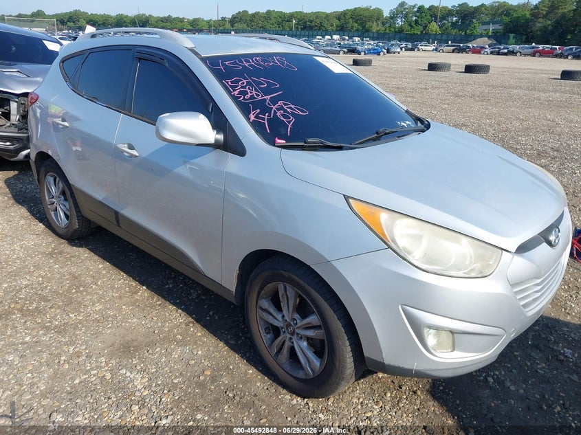 2010 Hyundai Tucson VIN KM8JU3AC9AU044328 IAAI salvage auction — FRONT & REAR, Mv-907A (New York), sold $1,900 on 2026-07-14 (photo 1)