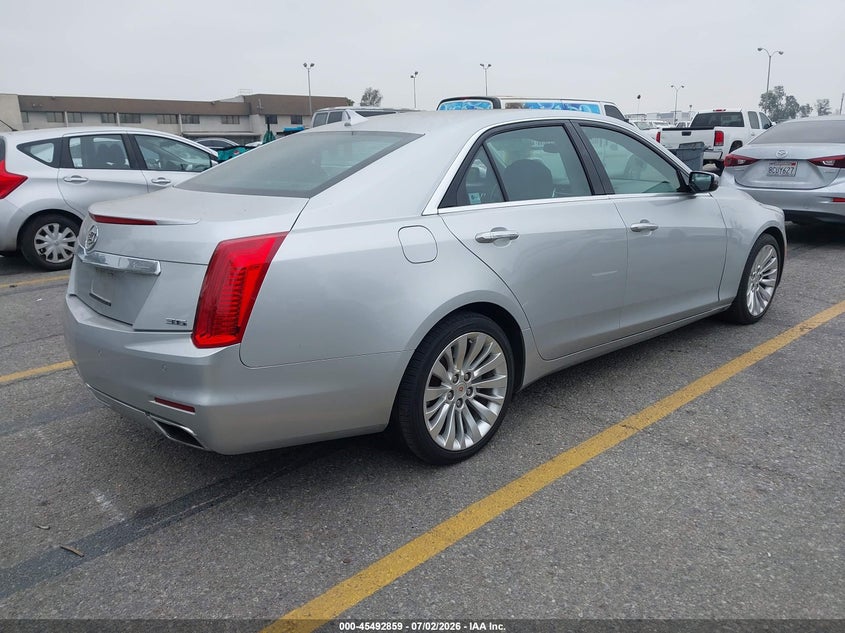 2014 Cadillac Cts VIN 1G6AR5S39E0177882 IAAI salvage auction — SIDE, Salvage (California), sold $1,750 on 2026-07-19 (photo 4)