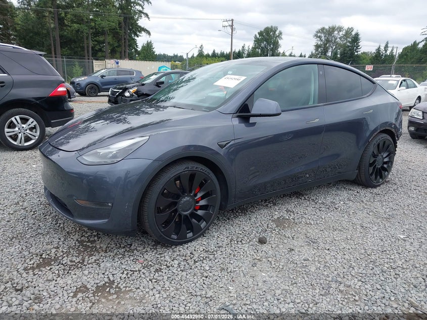 2022 Tesla Model y VIN 7SAYGDEF7NF342432 IAAI salvage auction — REAR END, Salvage Title, sold $11,675 on 2026-07-22 (photo 2)