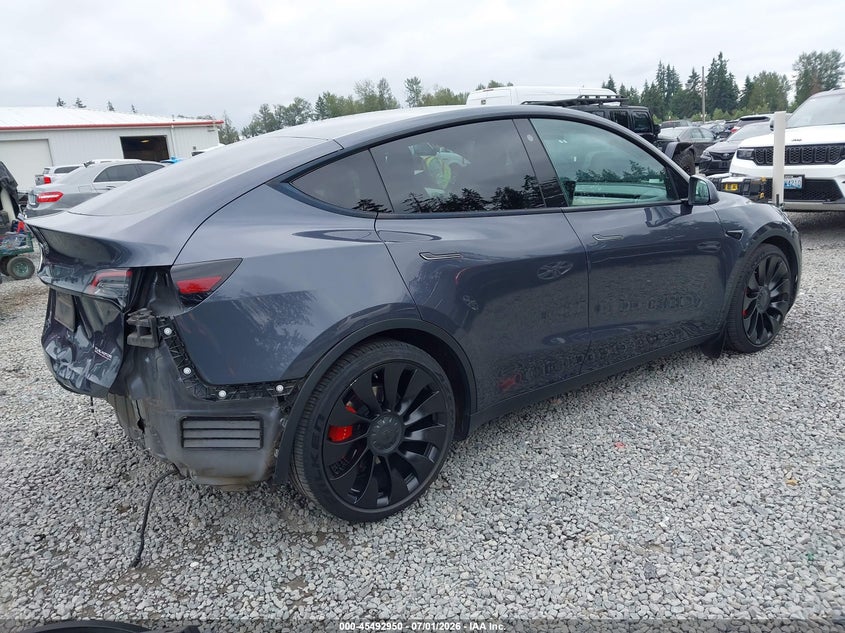 2022 Tesla Model y VIN 7SAYGDEF7NF342432 IAAI salvage auction — REAR END, Salvage Title, sold $11,675 on 2026-07-22 (photo 4)