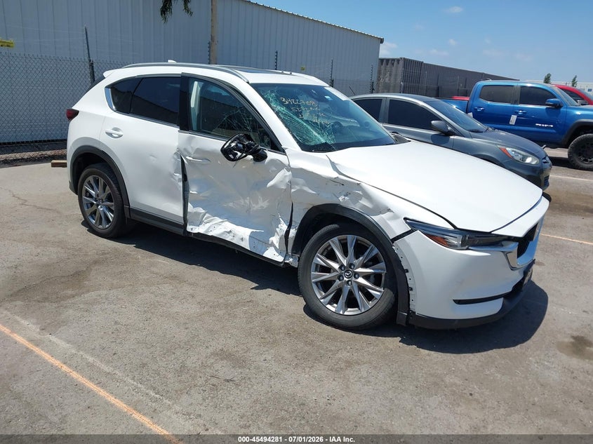 2021 Mazda Cx-5 VIN JM3KFADMXM1367568 IAAI salvage auction — SIDE, Salvage (California), sold $3,500 on 2026-07-28 (photo 1)