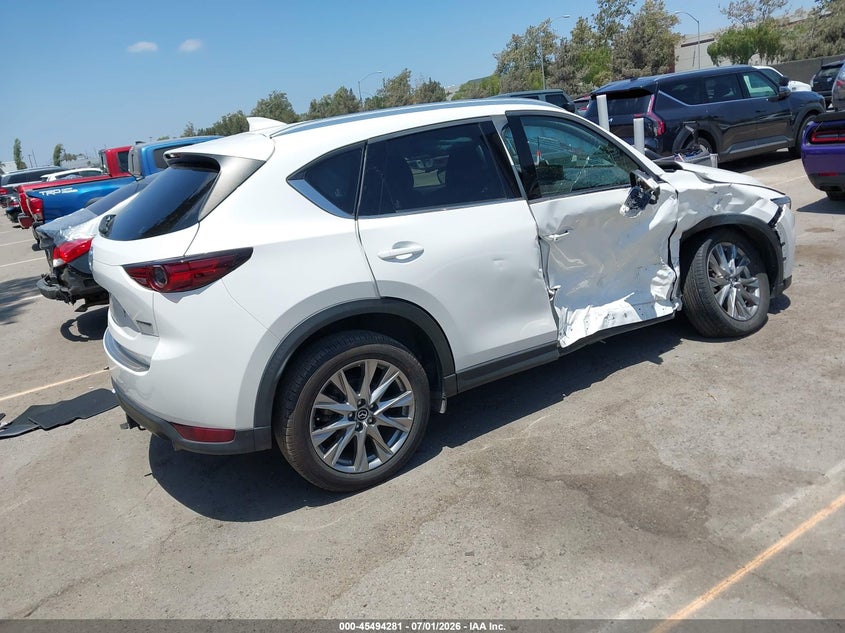 2021 Mazda Cx-5 VIN JM3KFADMXM1367568 IAAI salvage auction — SIDE, Salvage (California), sold $3,500 on 2026-07-28 (photo 4)