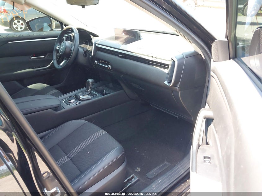 2025 Mazda Cx-50 VIN 7MMVABDM8SN355905 IAAI salvage auction — SIDE, Wait Title, sold $9,100 on 2026-08-21 (photo 5)
