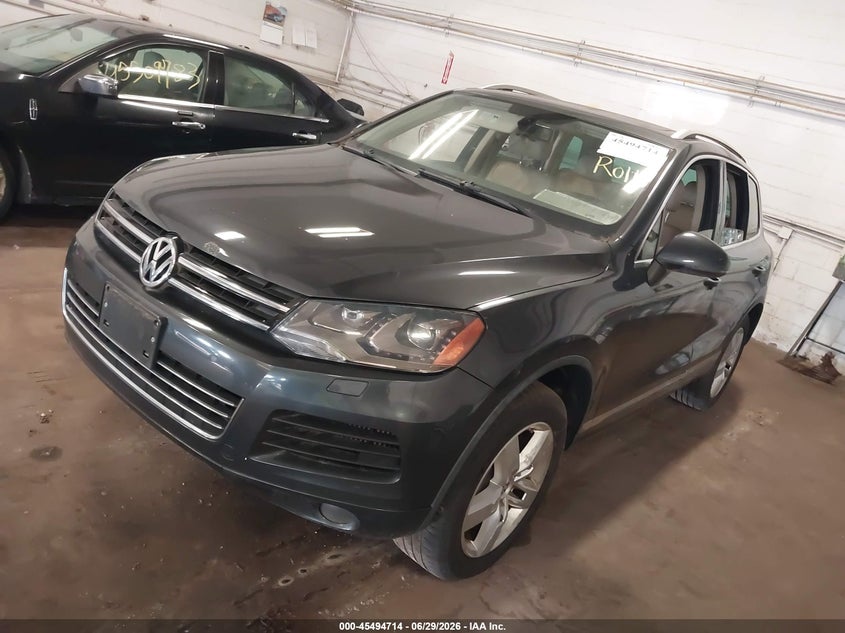 2011 Volkswagen Touareg VIN WVGFK9BPXBD006740 IAAI salvage auction — NORMAL WEAR, Clear (Minnesota), sold $1,450 on 2026-07-08 (photo 2)