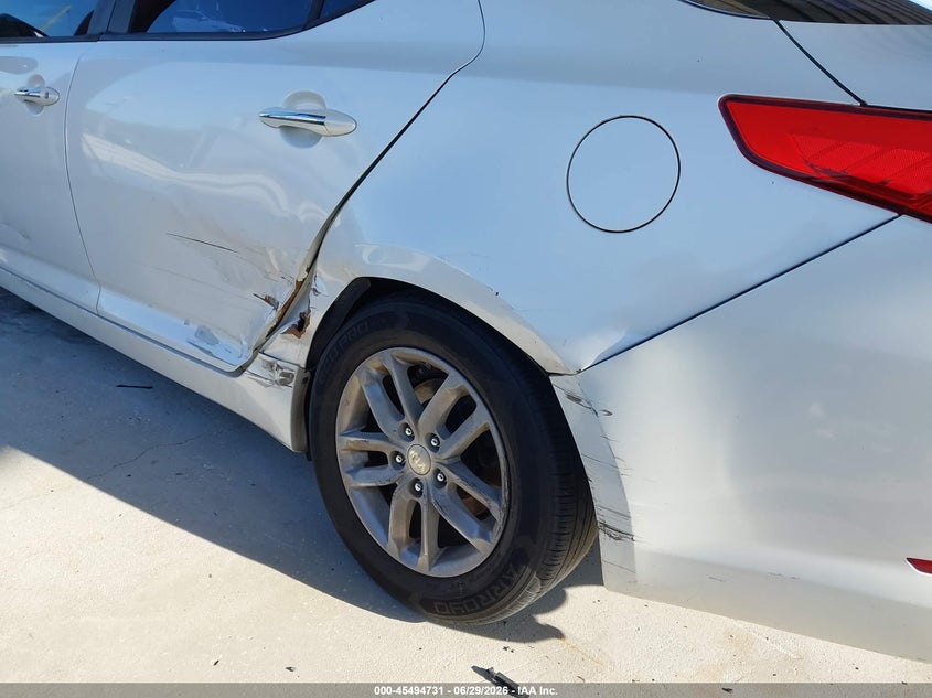 2012 Kia Optima VIN KNAGM4A76C5289640 IAAI salvage auction — SIDE, Rebuildable (Florida), sold $25 on 2026-07-21 (photo 6)