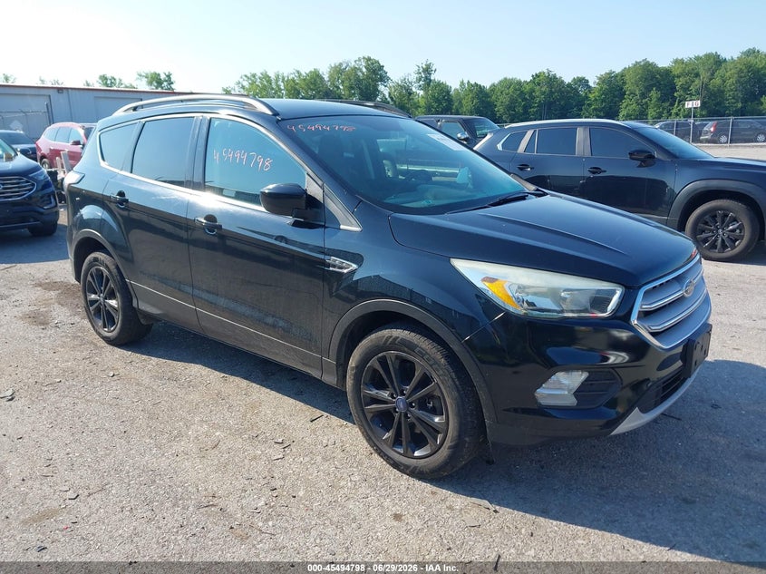 2018 Ford Escape VIN 1FMCU9GD3JUA00143 IAAI salvage auction — NORMAL WEAR, Clear (New York), sold $475 on 2026-07-21 (photo 1)