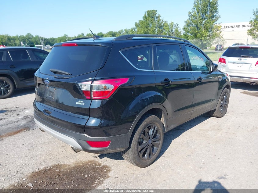 2018 Ford Escape VIN 1FMCU9GD3JUA00143 IAAI salvage auction — NORMAL WEAR, Clear (New York), sold $475 on 2026-07-21 (photo 4)