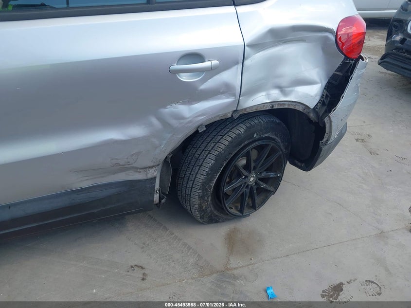 2014 Volkswagen Tiguan VIN WVGAV3AX4EW596748 IAAI salvage auction — LEFT REAR, Salvage (Texas), sold $1,425 on 2026-08-04 (photo 6)