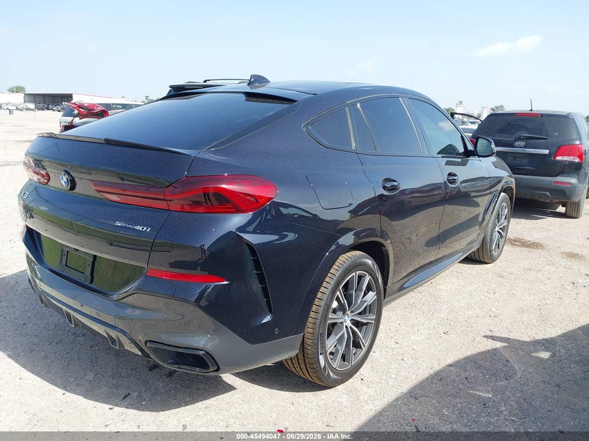 2020 BMW X6 VIN 5UXCY4C07L9B65800 IAAI salvage auction — Exterior Burn, Salvage, sold $30,000 on 2026-08-25 (photo 4)