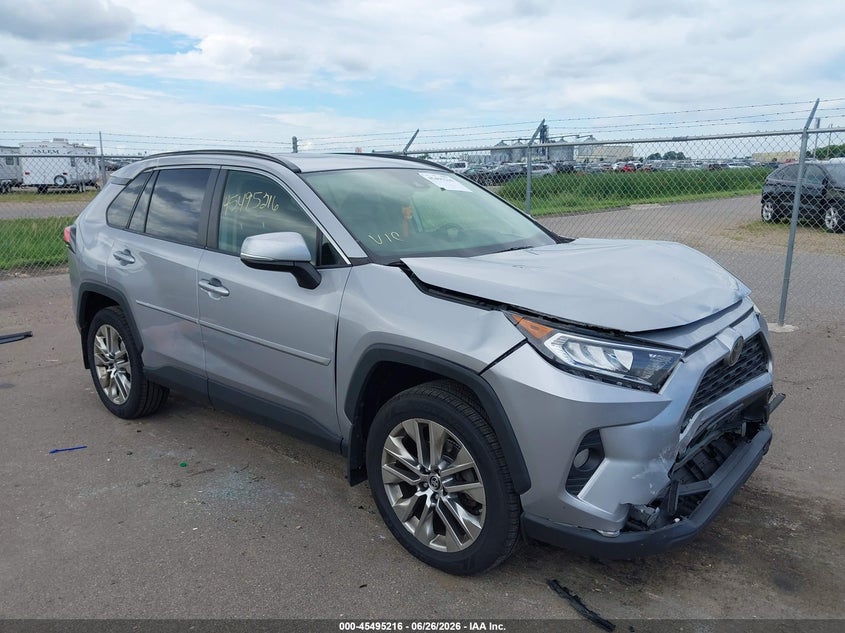 2019 Toyota Rav 4 VIN JTMA1RFV1KD015479 — IAAI salvage auction photo