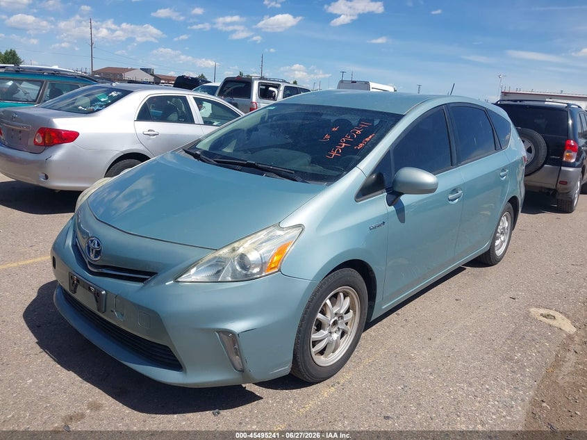 2014 Toyota Prius v VIN JTDZN3EU7E3312845 IAAI salvage auction — NORMAL WEAR, Clear (Colorado), sold $2,500 on 2026-07-28 (photo 2)