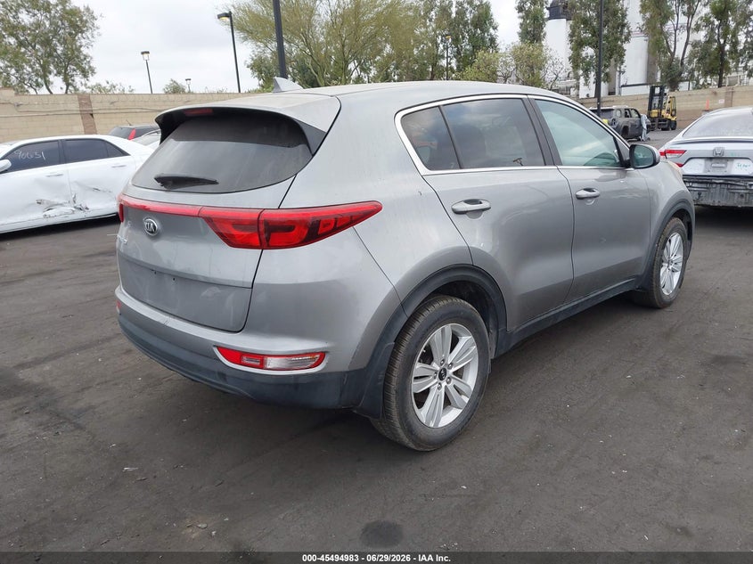2019 Kia Sportage VIN KNDPM3AC3K7573126 IAAI salvage auction — THEFT, Salvage Title, sold $4,050 on 2026-07-17 (photo 4)