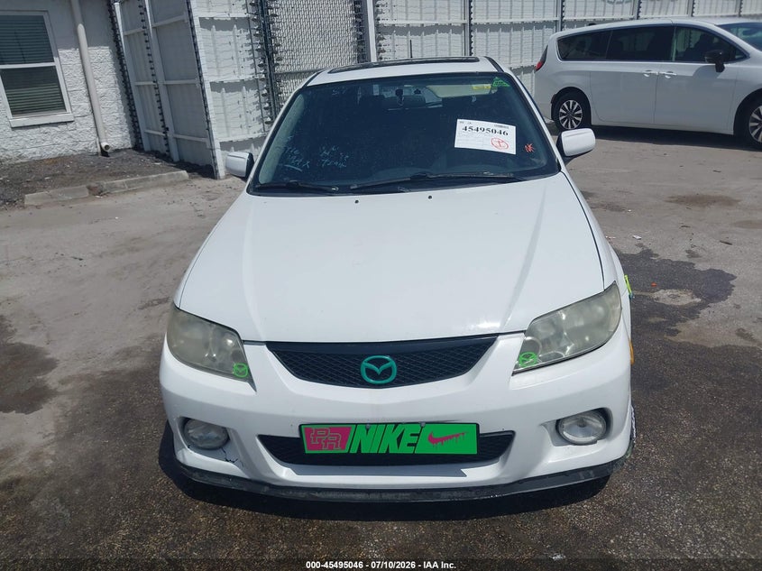 2003 Mazda Protege VIN JM1BJ246031186654 IAAI salvage auction — NORMAL WEAR, Clear (Florida), sold $25 on 2026-07-29 (photo 6)