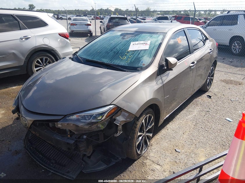 2017 Toyota Corolla VIN 5YFBURHE6HP573133 IAAI salvage auction — SIDE, Salvage (Louisiana), sold $1,900 on 2026-07-28 (photo 2)