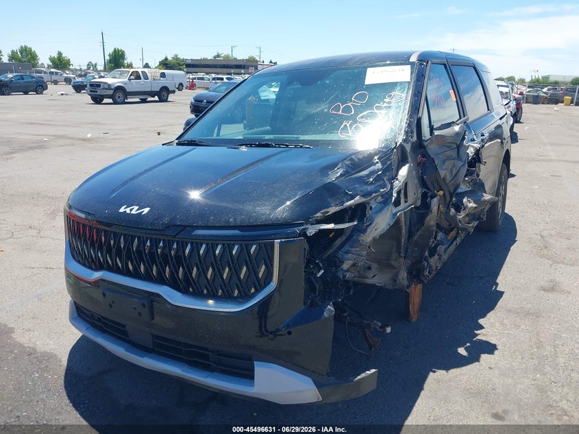 2026 Kia Carnival VIN KNDNB5KA9T6129049 IAAI salvage auction — SIDE, Salvage Title, sold $5,500 on 2026-07-12 (photo 2)
