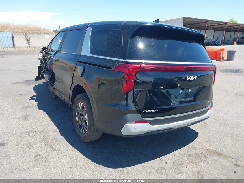 2026 Kia Carnival VIN KNDNB5KA9T6129049 IAAI salvage auction — SIDE, Salvage Title, sold $5,500 on 2026-07-12 (photo 3)