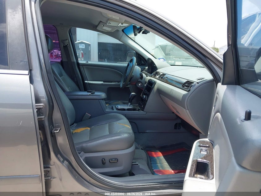 2005 Mercury Montego VIN 1MEHM43185G605657 IAAI salvage auction — NORMAL WEAR, Original (Texas), sold $250 on 2026-07-14 (photo 5)