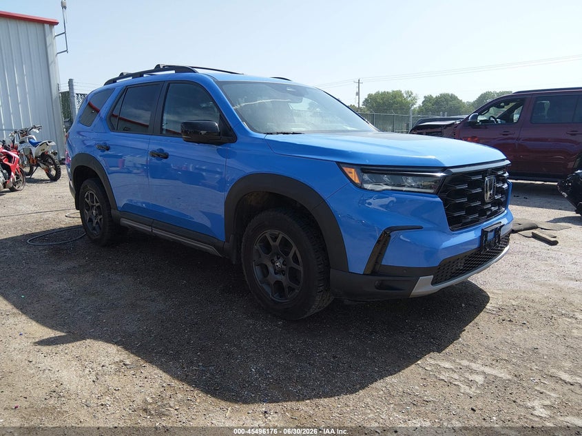 2023 Honda Pilot VIN 5FNYG1H69PB001091 — IAAI salvage auction photo
