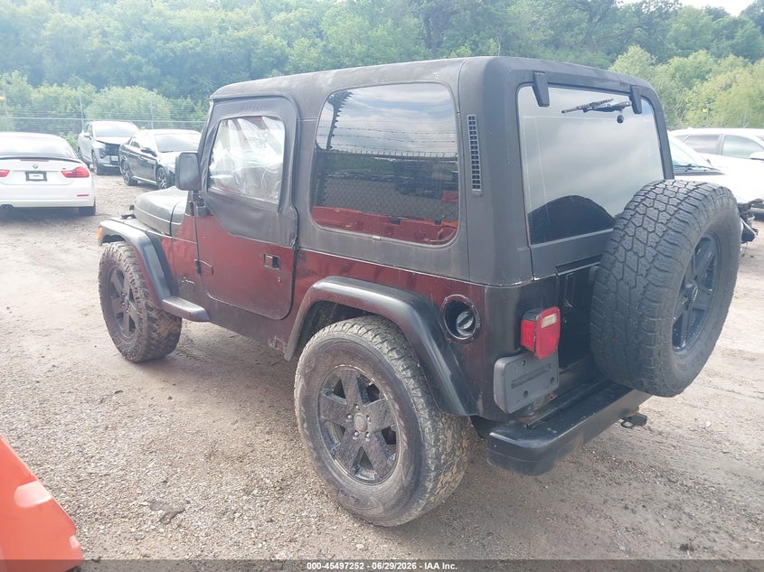 1997 Jeep Wrangler / VIN 1J4FY29P3VP517400 IAAI salvage auction — NORMAL WEAR, Clear (Wisconsin), sold $1,200 on 2026-07-08 (photo 3)