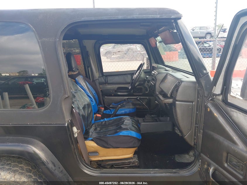 1997 Jeep Wrangler / VIN 1J4FY29P3VP517400 IAAI salvage auction — NORMAL WEAR, Clear (Wisconsin), sold $1,200 on 2026-07-08 (photo 5)