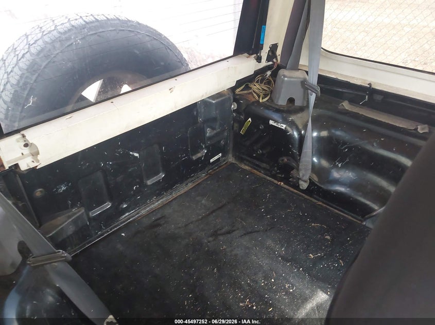 1997 Jeep Wrangler / VIN 1J4FY29P3VP517400 IAAI salvage auction — NORMAL WEAR, Clear (Wisconsin), sold $1,200 on 2026-07-08 (photo 8)
