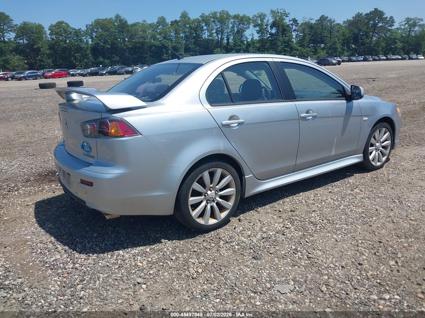 2010 Mitsubishi Lancer VIN JA32U8FW0AU024380 IAAI salvage auction — NORMAL WEAR, Clear (New York), sold $500 on 2026-07-07 (photo 4)