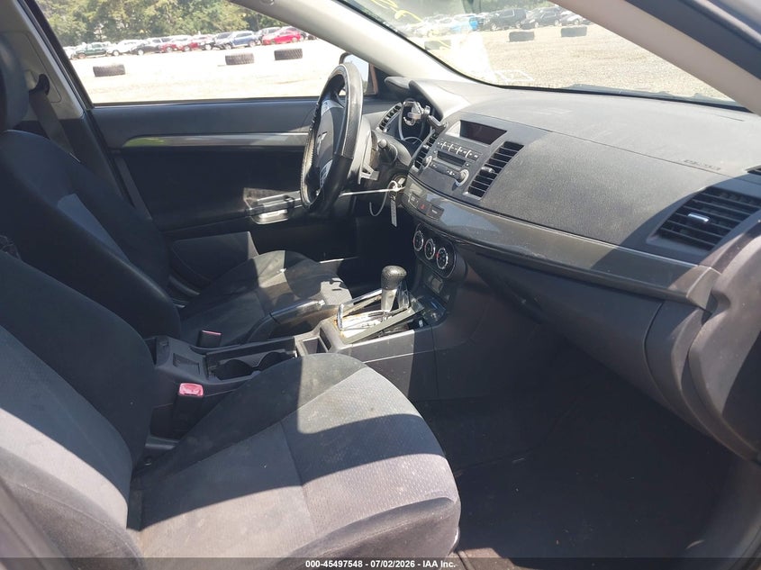 2010 Mitsubishi Lancer VIN JA32U8FW0AU024380 IAAI salvage auction — NORMAL WEAR, Clear (New York), sold $500 on 2026-07-07 (photo 5)