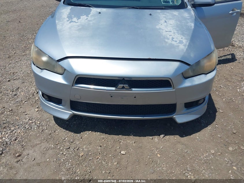 2010 Mitsubishi Lancer VIN JA32U8FW0AU024380 IAAI salvage auction — NORMAL WEAR, Clear (New York), sold $500 on 2026-07-07 (photo 6)