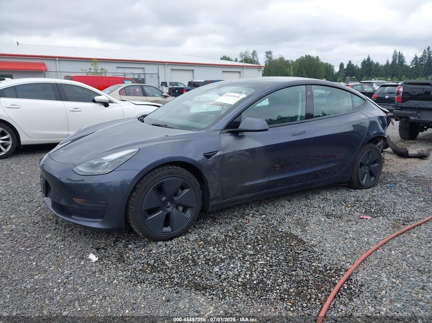2023 Tesla Model 3 VIN 5YJ3E1EA7PF581160 IAAI salvage auction — REAR END, Bill Of Sale (Washington), sold $5,200 on 2026-07-22 (photo 2)