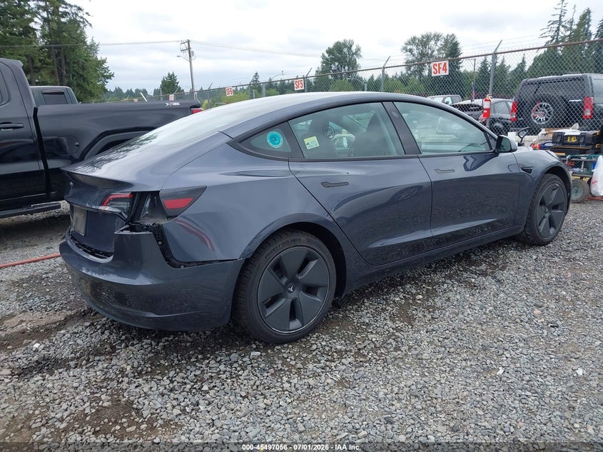 2023 Tesla Model 3 VIN 5YJ3E1EA7PF581160 IAAI salvage auction — REAR END, Bill Of Sale (Washington), sold $5,200 on 2026-07-22 (photo 4)